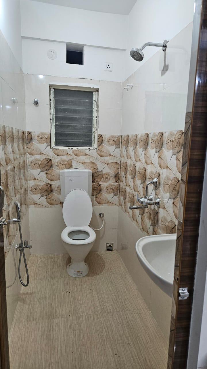Neat washroom with shower and geyser